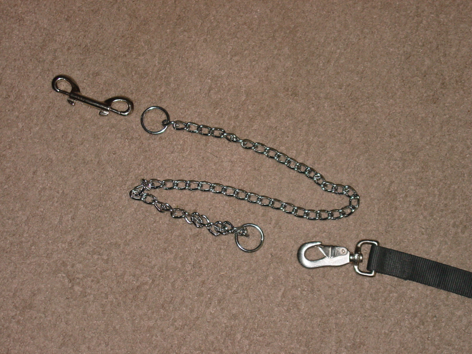 44-8453. Snap, choke chain, and leash