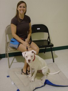 52-9608. Amy and "Mosby," a deaf Pit Bull terrier.